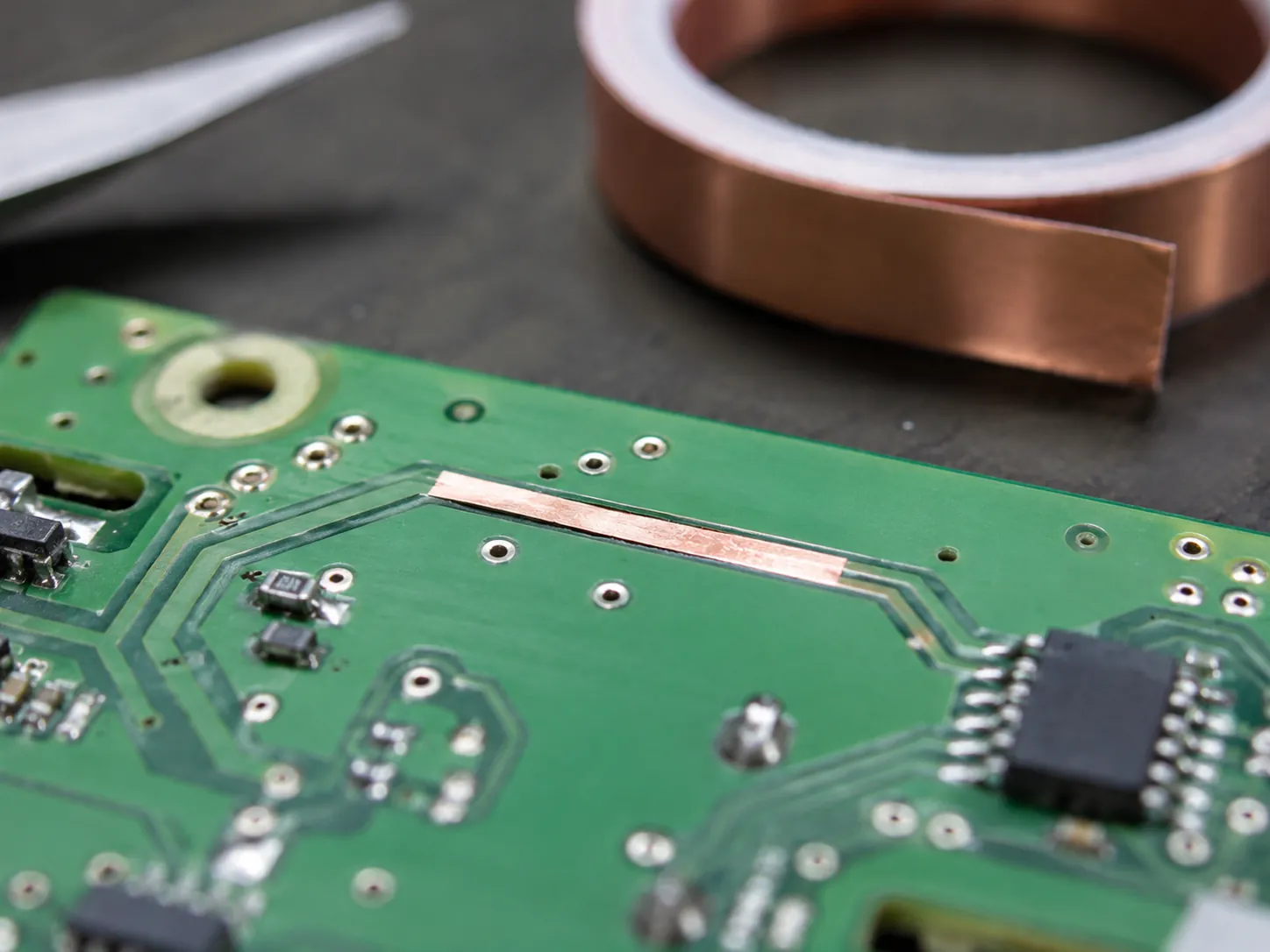 Copper foil tape used for printed circuit board trace repair